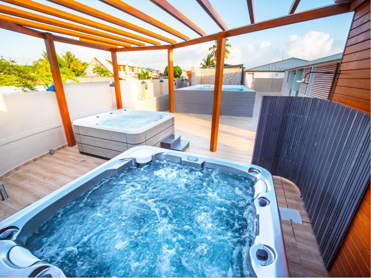 Evasion En Plein Coeur De La Ville Studio Jacuzzis Sauna Et Piscine Au Centre De ปอร์-หลุยส์ ภายนอก รูปภาพ